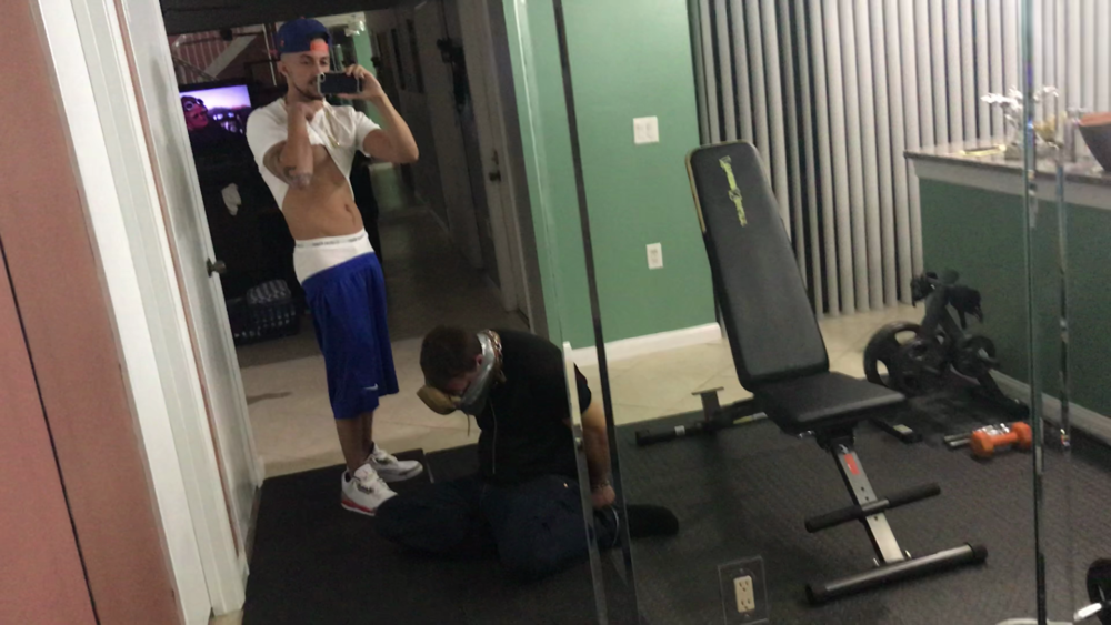 Gagged Sub with Boot Taped to Face