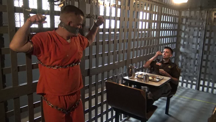 Taunting and Feeding Bound Inmate